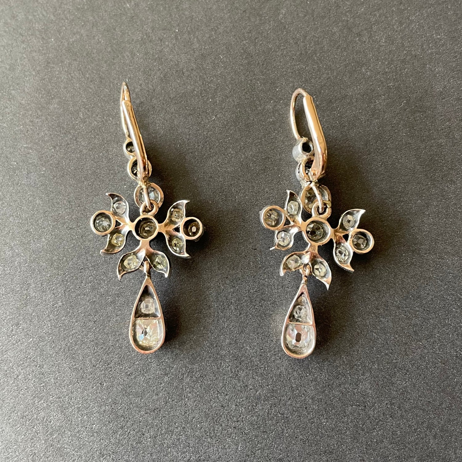 Back of antique diamond earrings in gold.
