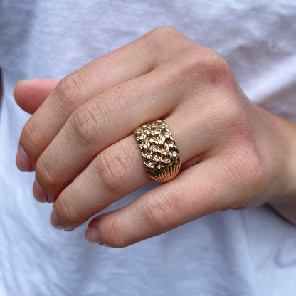 Large gold keeper ring.